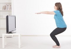 Woman using Virtual Fitness to Exercise