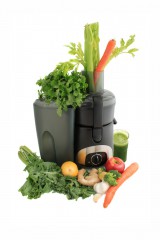Juicer with fruits and vegetables