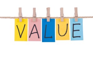 Value, Colorful words hang on rope by wooden peg