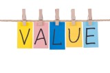 Value, Colorful words hang on rope by wooden peg