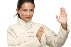 Woman doing a Kung fu pose