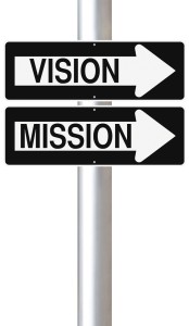 One way road signs "Vision" and "Mission"