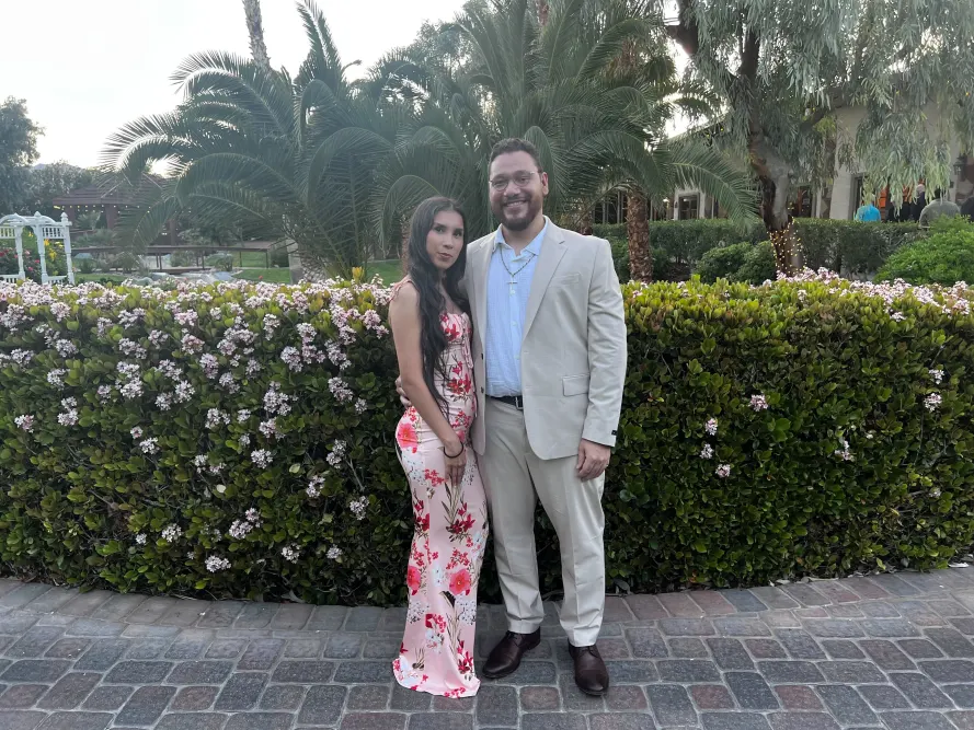 Lorenzo, gym management software customer care representative with his fiancé.